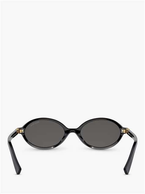 Miu Miu™ MU 04ZS Oval Sunglasses .